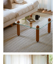 Clear Glass Coffee Table with Wooden Columns - ALINDA DECOR