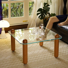 Clear Glass Coffee Table with Wooden Columns - ALINDA DECOR