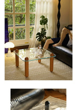 Clear Glass Coffee Table with Wooden Columns - ALINDA DECOR